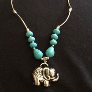 Silver  necklace with turquoise elephant charm